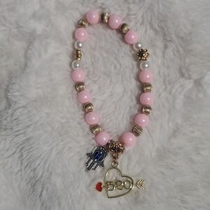 Pink and Gold Beaded Bracelet with Charms